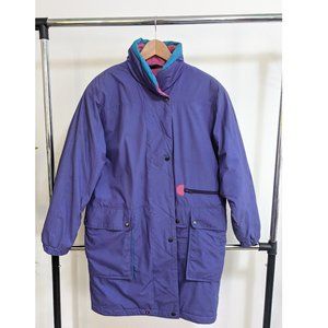 Purple winter jacket with accents of pink and teal
